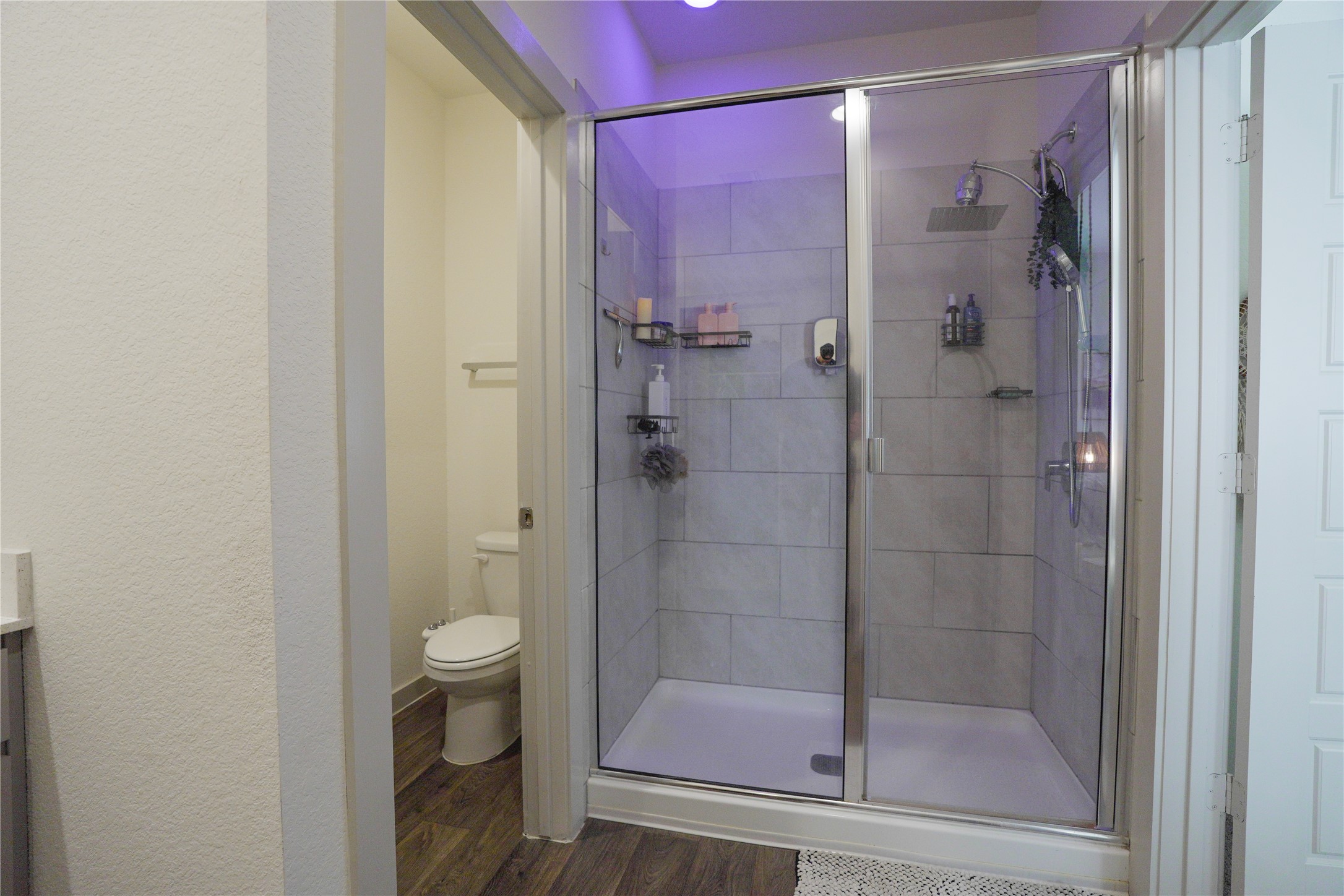 4605 Tully Drive Pflugerville, TX 78660 - Photo 14 of 38 a bathroom with a shower and toilet