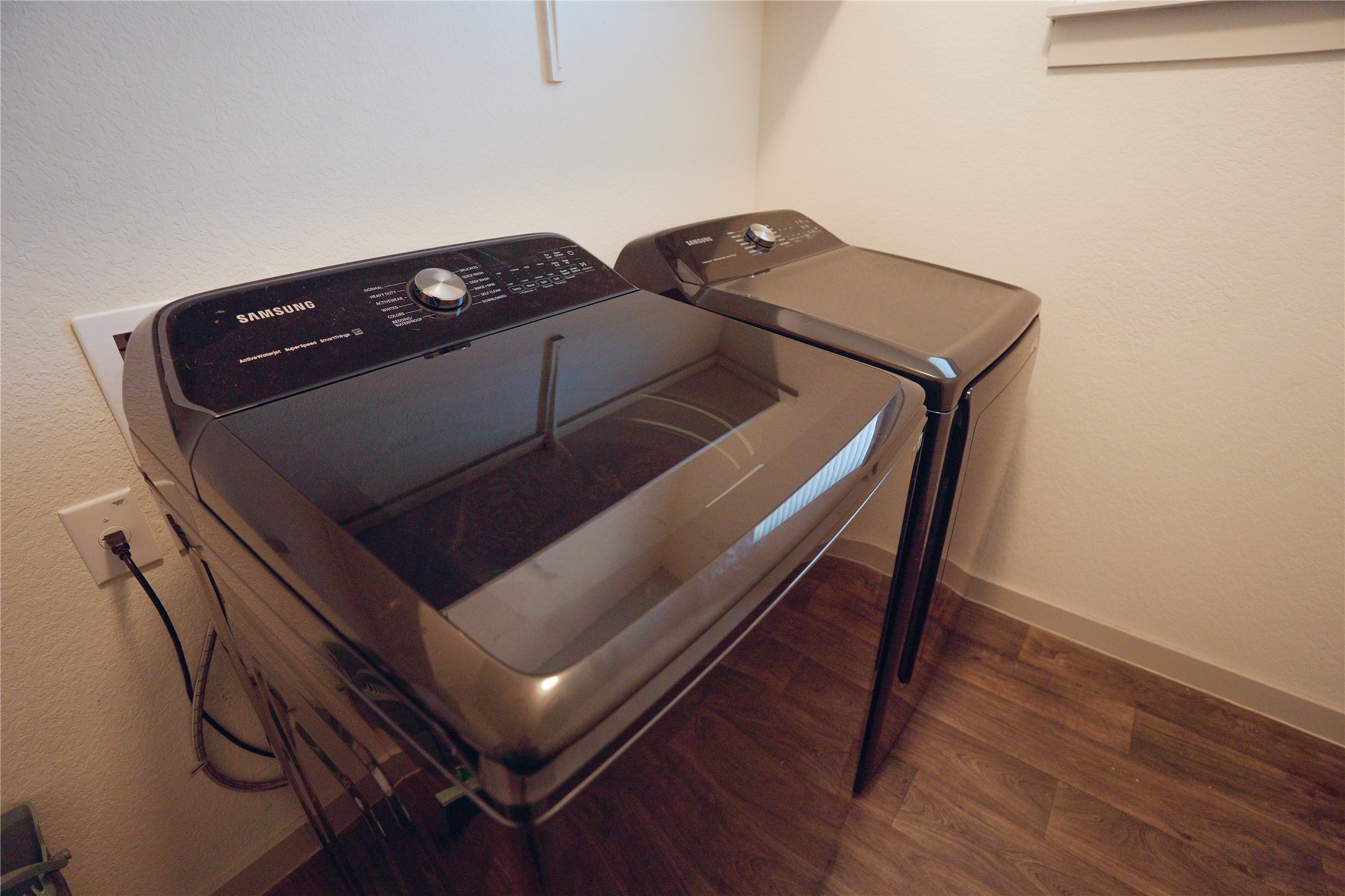 4605 Tully Drive Pflugerville, TX 78660 - Photo 16 of 38 a view of staircase with wooden floor
