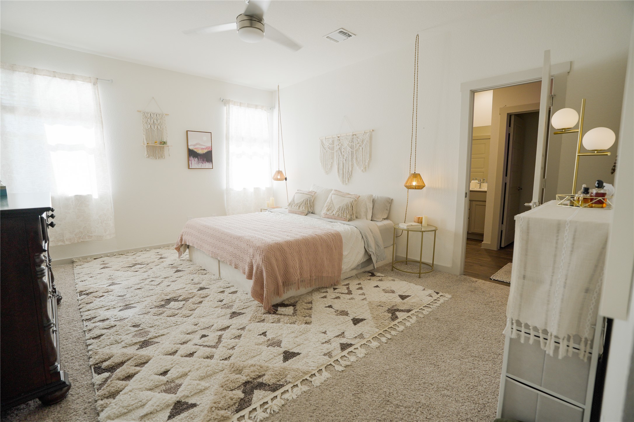 4605 Tully Drive Pflugerville, TX 78660 - Photo 2 of 38 a bedroom with a bed and a couch