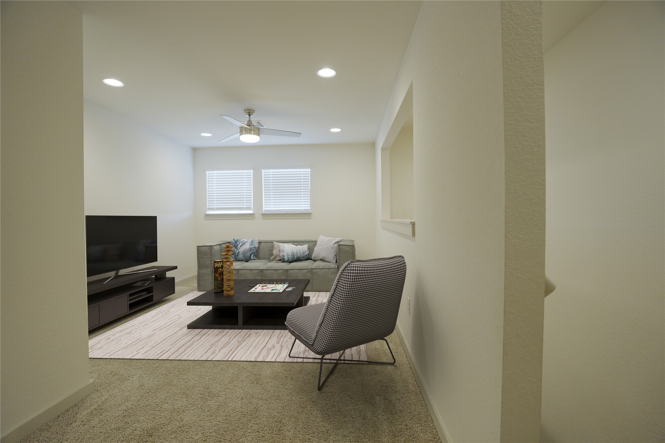 4605 Tully Drive Pflugerville, TX 78660 - Photo 21 of 38 a living room with furniture and a flat screen tv