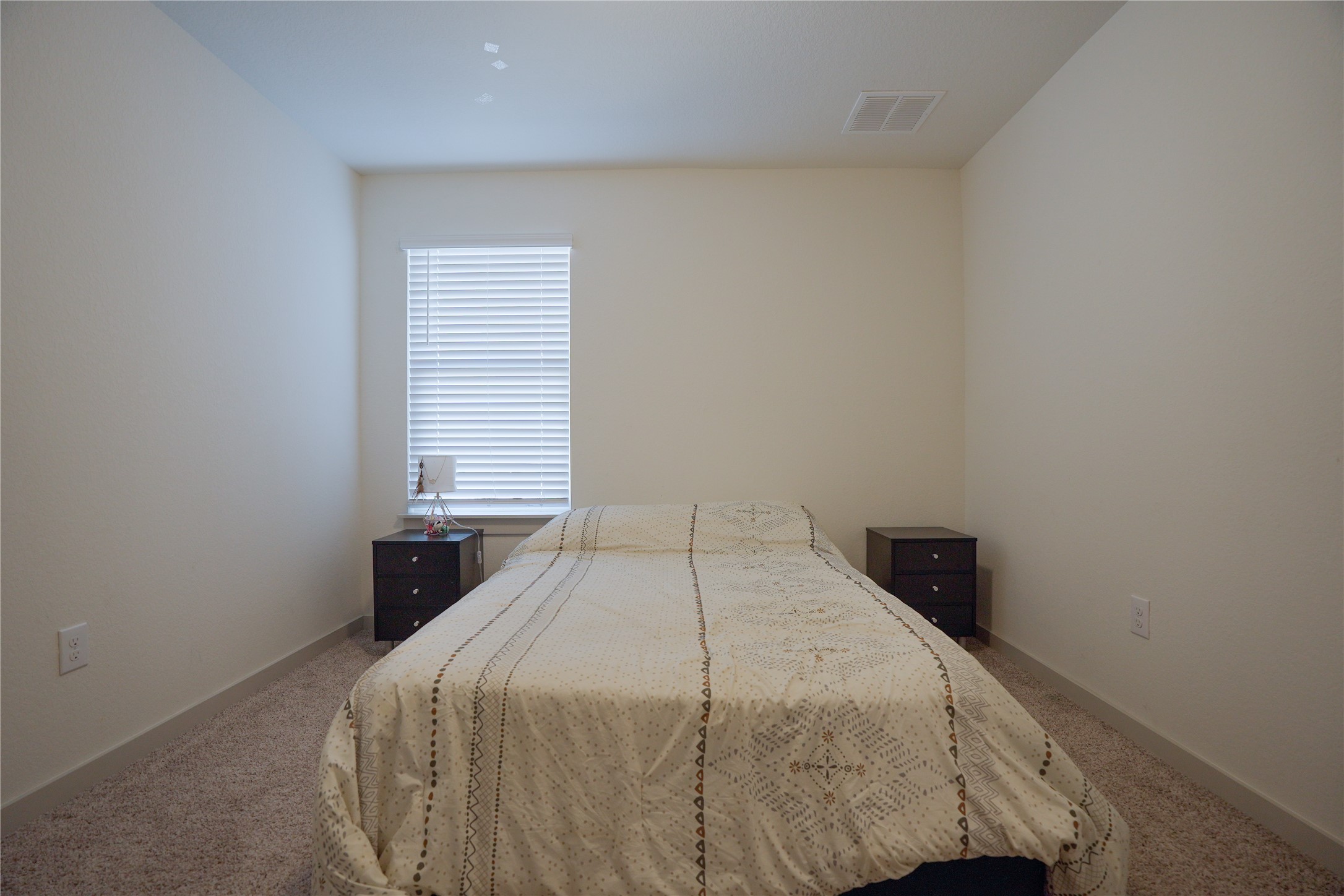 4605 Tully Drive Pflugerville, TX 78660 - Photo 25 of 38 a bedroom with a bed and a window