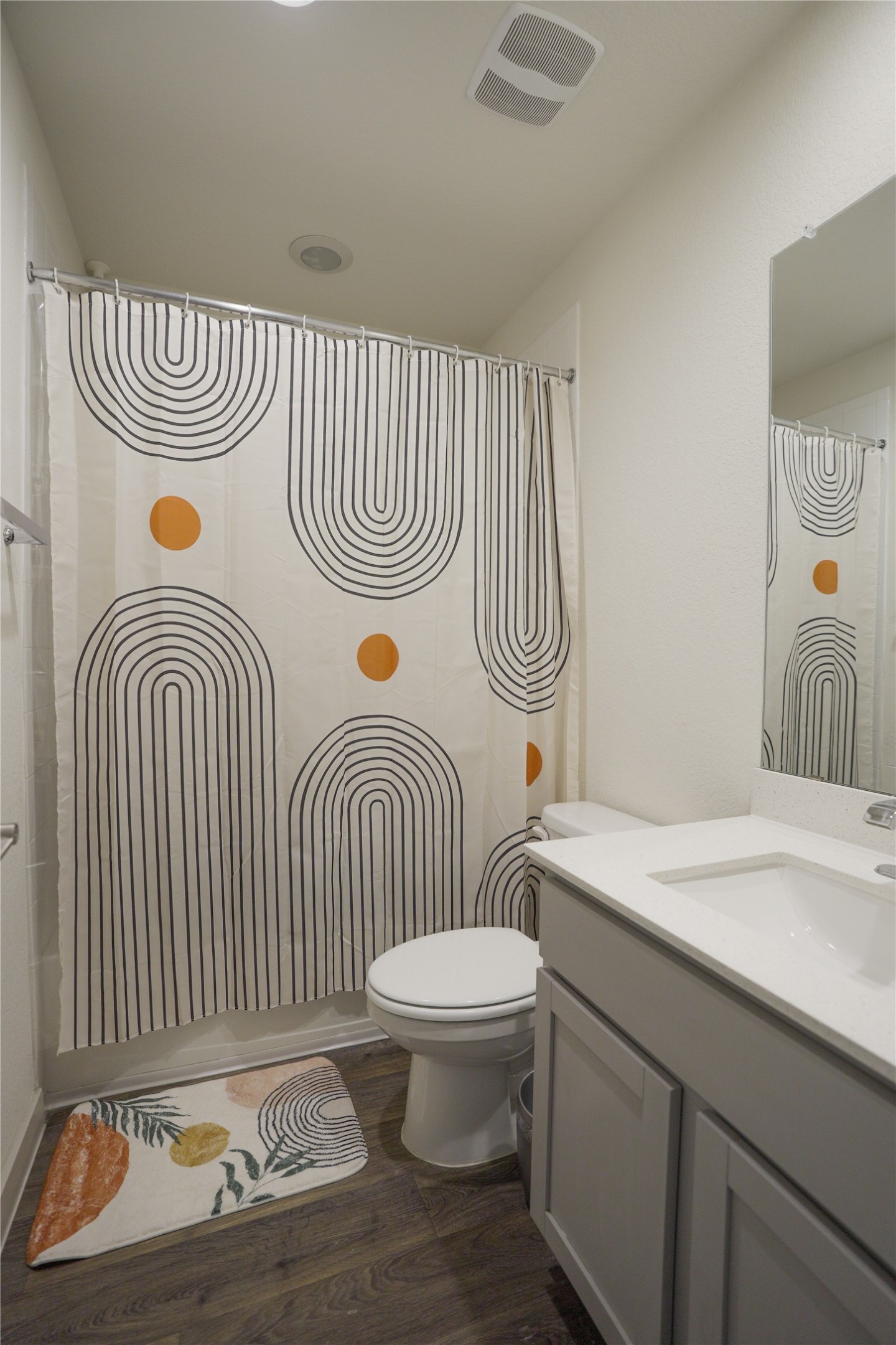 4605 Tully Drive Pflugerville, TX 78660 - Photo 26 of 38 a bathroom with a sink a toilet and a shower