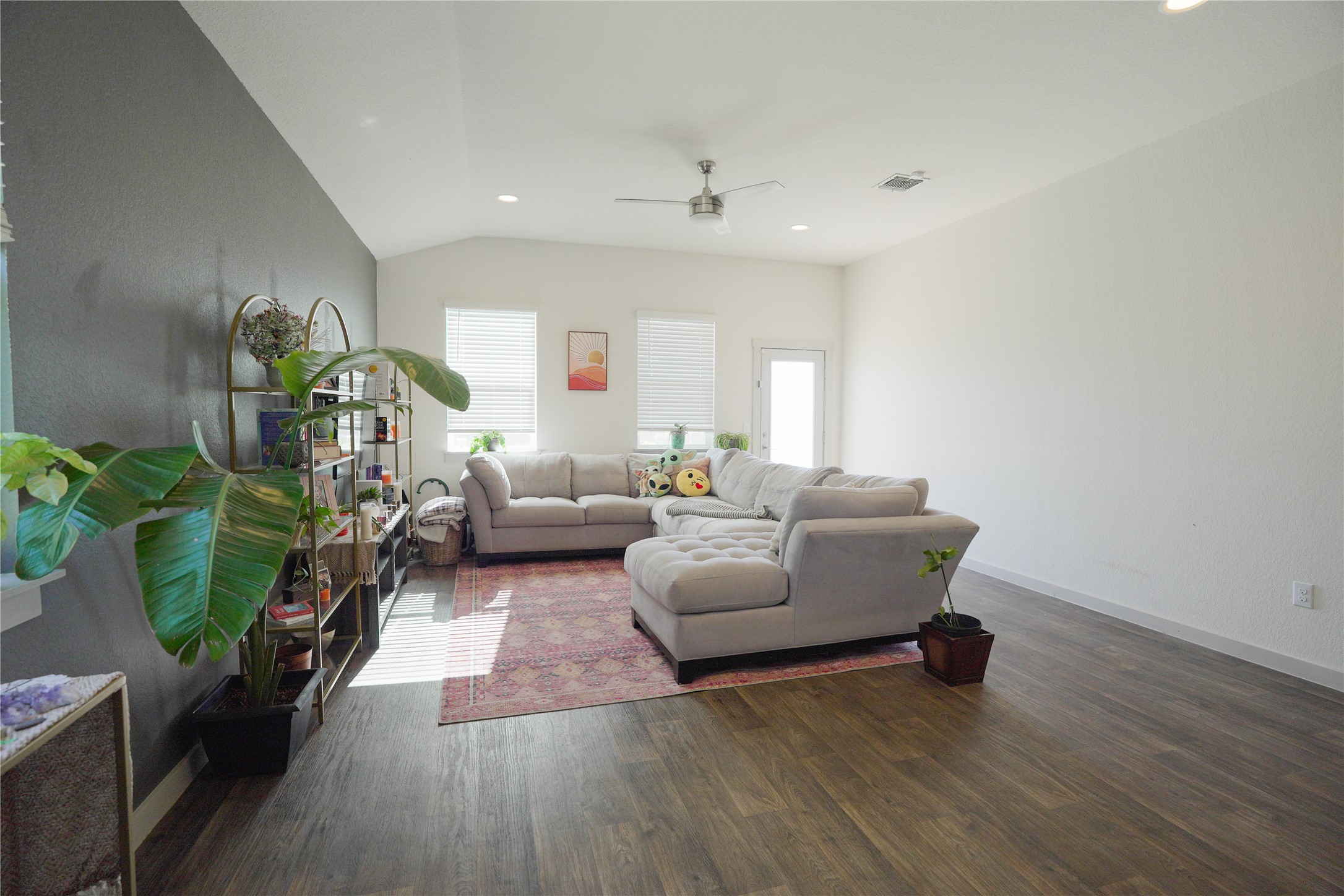 4605 Tully Drive Pflugerville, TX 78660 - Photo 6 of 38 a living room with furniture and a wooden floor