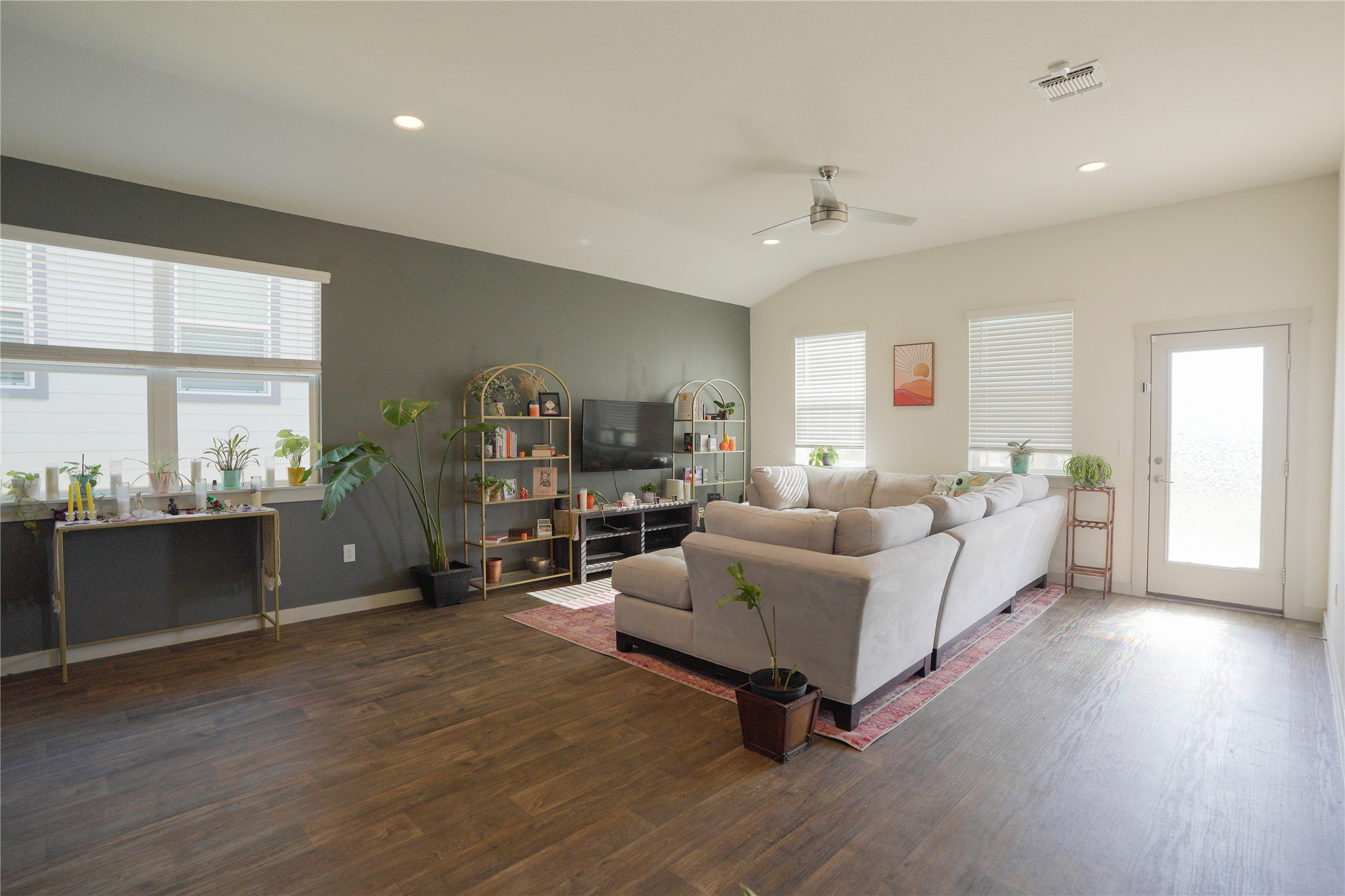 4605 Tully Drive Pflugerville, TX 78660 - Photo 7 of 38 a living room with furniture and a wooden floor