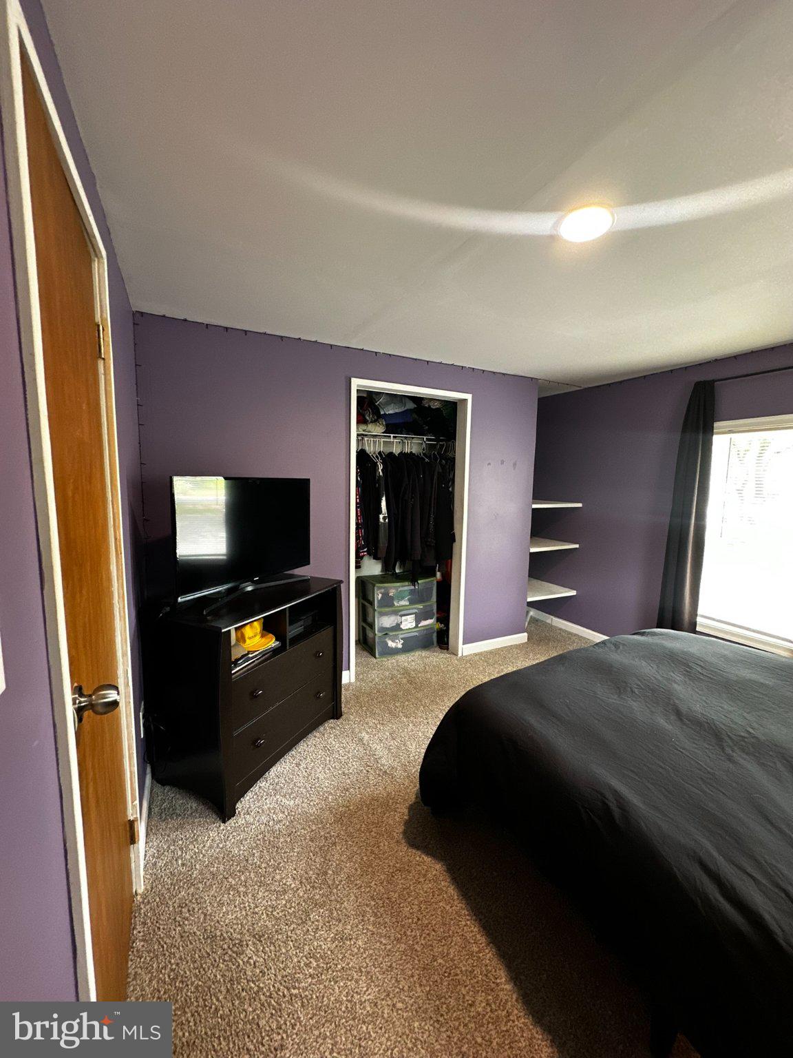 31777 Siham Road Lewes, DE 19958 - Photo 13 of 46 Cozy retreat with vibrant purple walls.