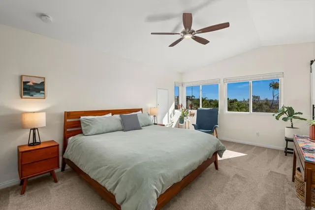 a view of a living room and a potted plant