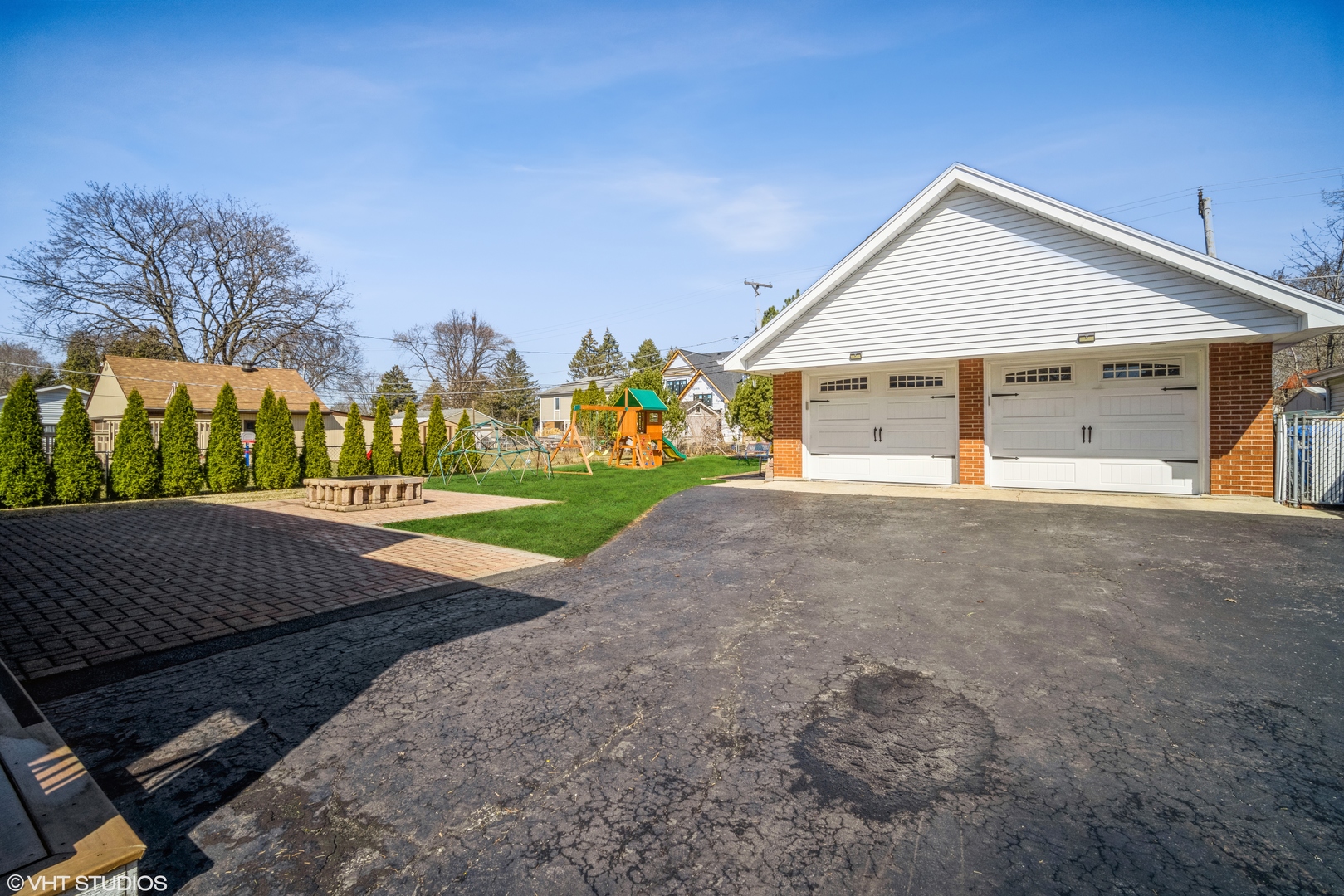 420 West Kensington Road Mount Prospect, IL 60056 - Photo 12 of 13 a view of an house with backyard and trees