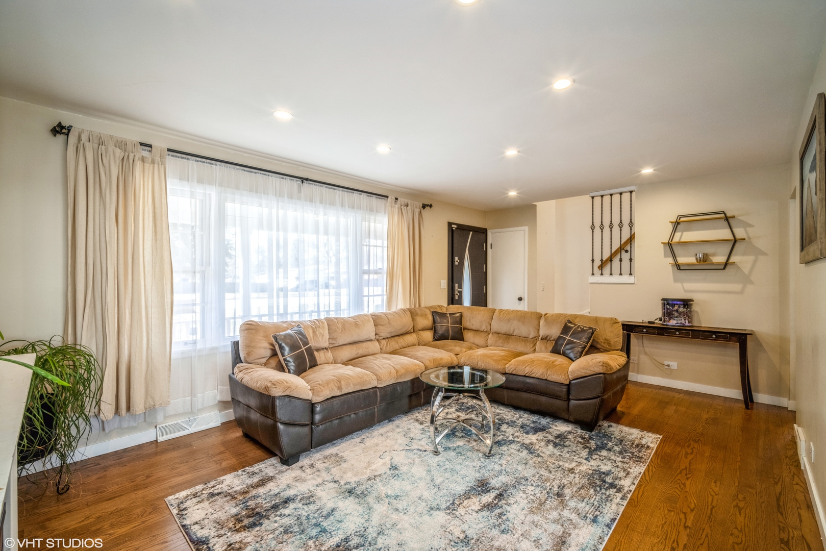 420 West Kensington Road Mount Prospect, IL 60056 - Photo 4 of 13 a living room with furniture and wooden floor