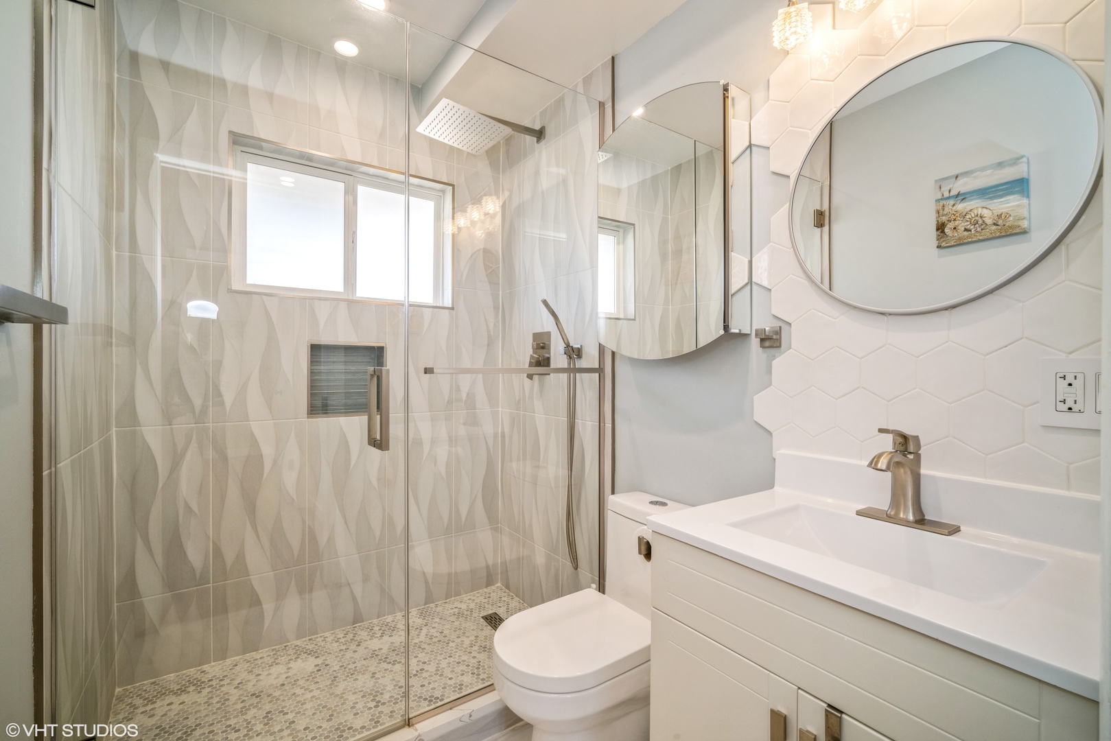 420 West Kensington Road Mount Prospect, IL 60056 - Photo 6 of 13 a bathroom with a sink a toilet and a mirror