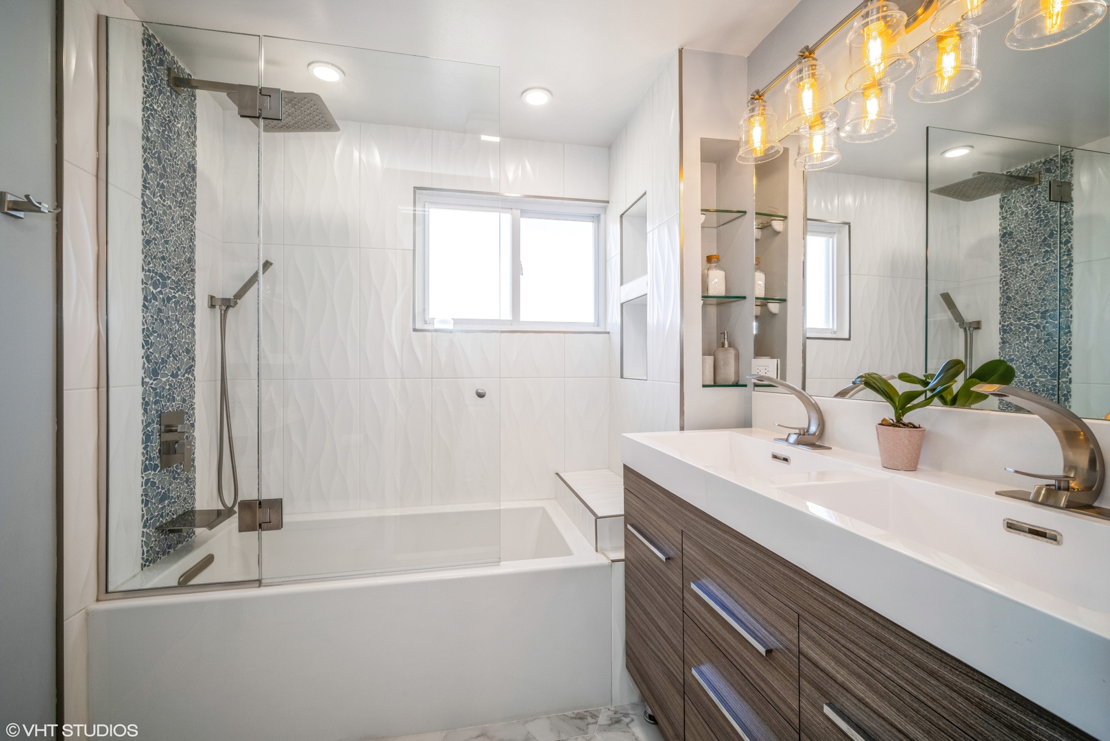 420 West Kensington Road Mount Prospect, IL 60056 - Photo 8 of 13 a bathroom with a bathtub a sink a large mirror and shower
