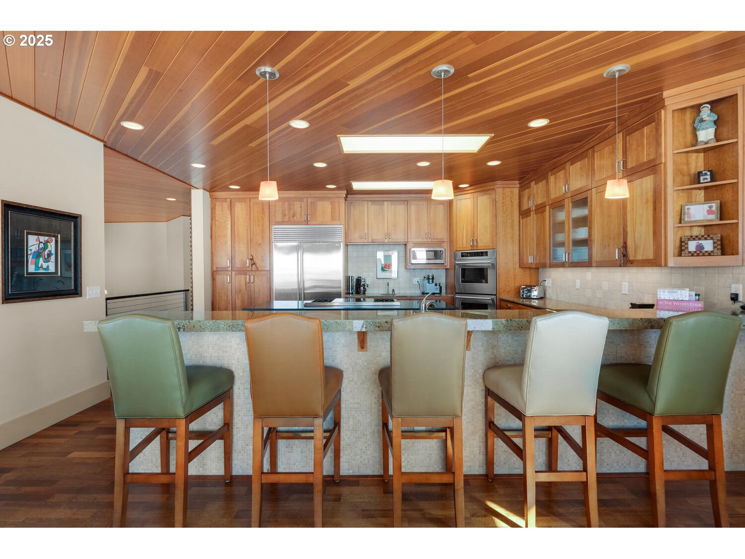 1880 Pacific Avenue Cannon Beach, OR 97110 - Photo 20 of 48 a dining room with furniture and a chandelier