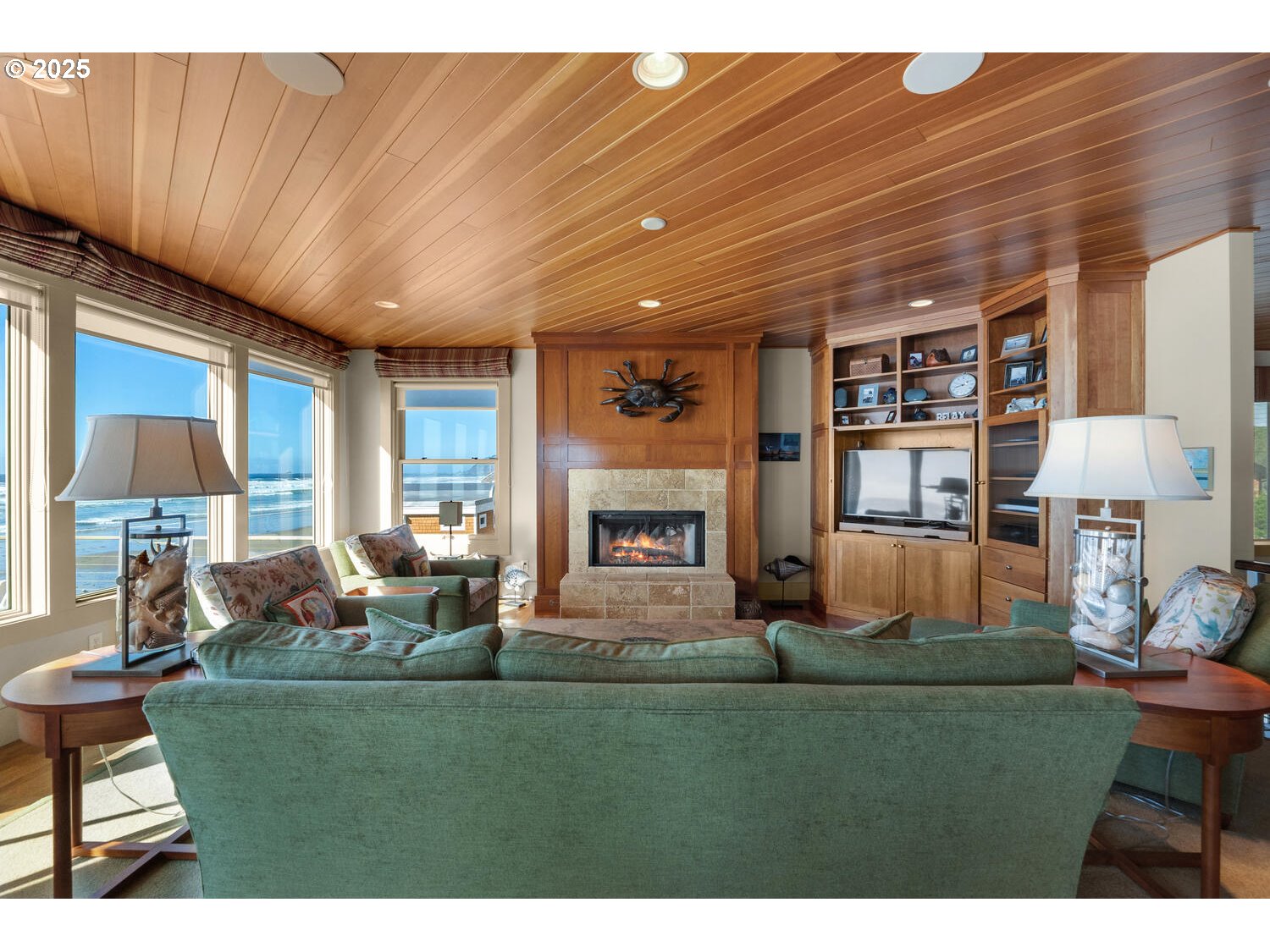 1880 Pacific Avenue Cannon Beach, OR 97110 - Photo 21 of 48 a living room with fireplace furniture and a large window