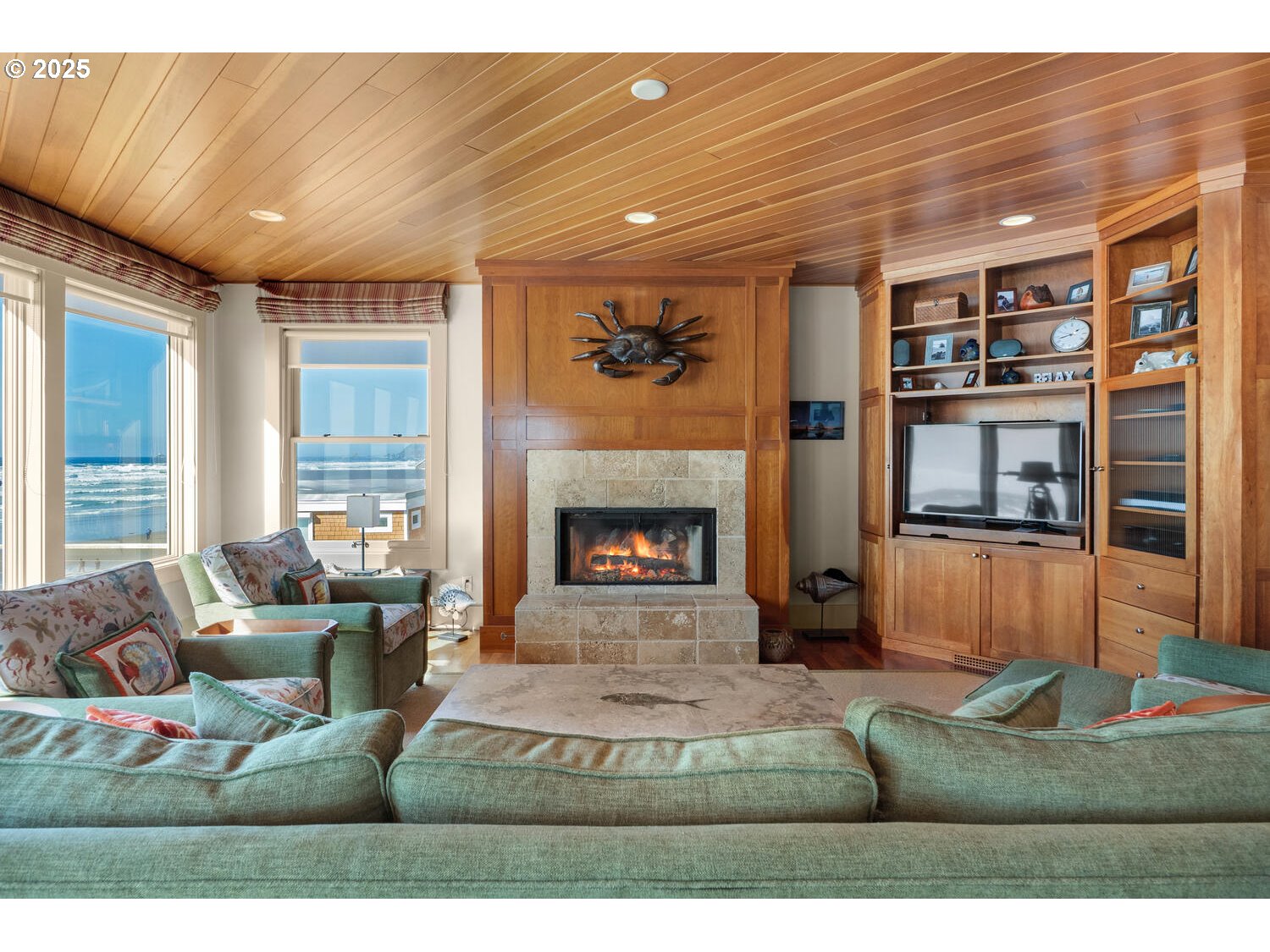 1880 Pacific Avenue Cannon Beach, OR 97110 - Photo 23 of 48 a living room with furniture and a fireplace
