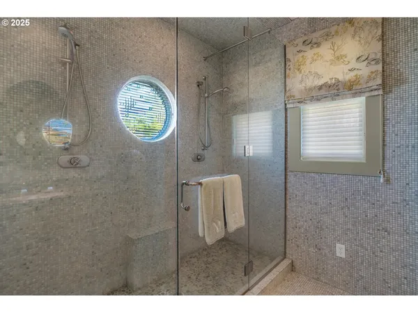 a bathroom with a bathtub and a sink