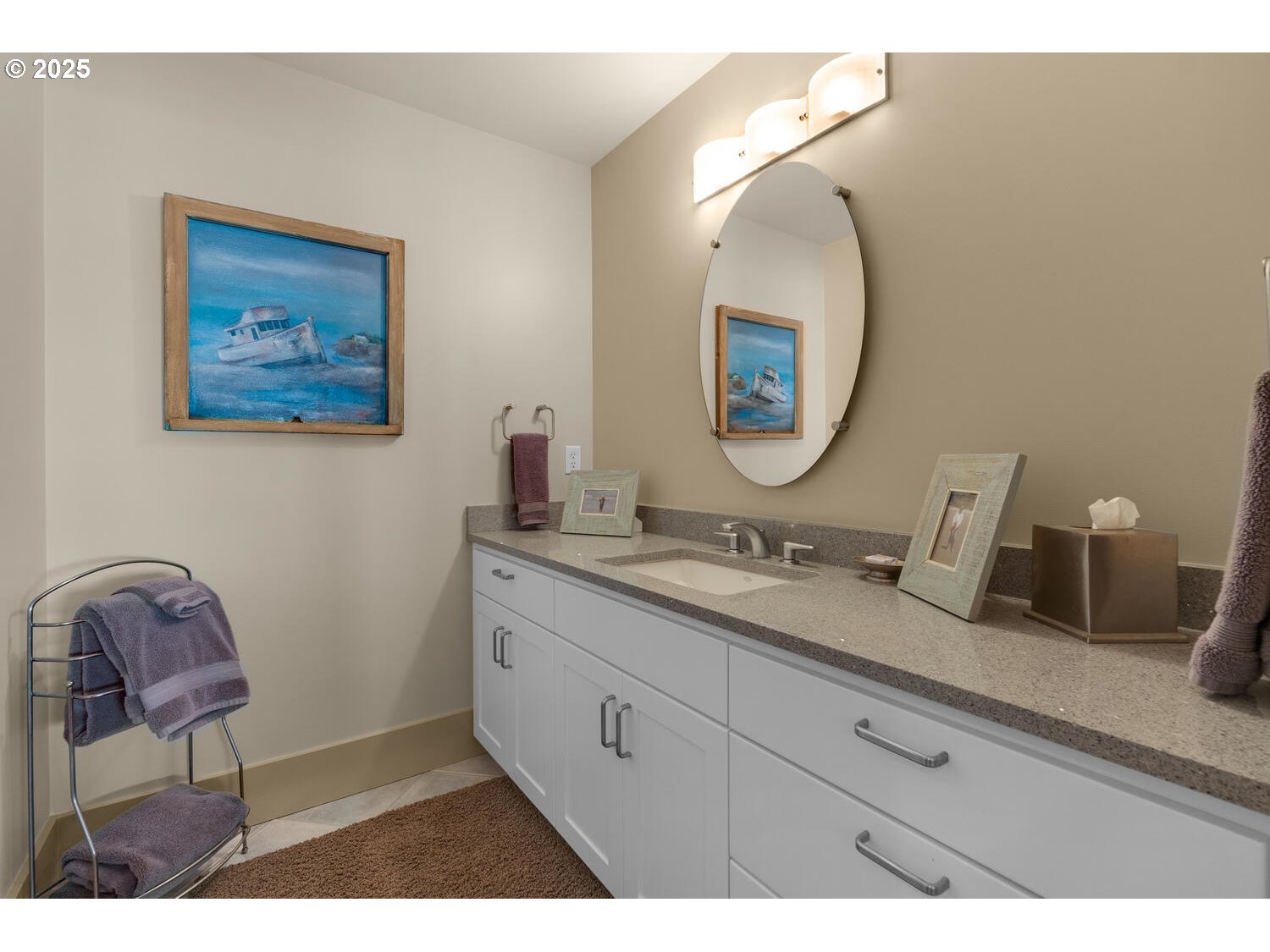 1880 Pacific Avenue Cannon Beach, OR 97110 - Photo 46 of 48 a bathroom with a toilet a sink and a mirror