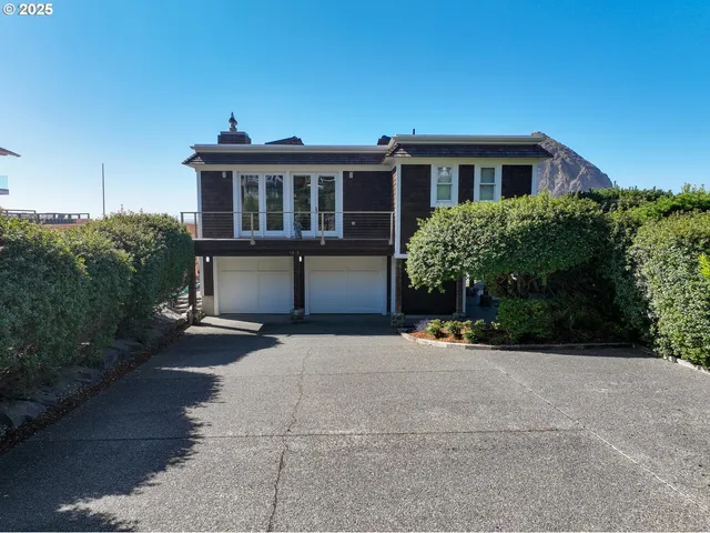 a view of house with outdoor space and street view