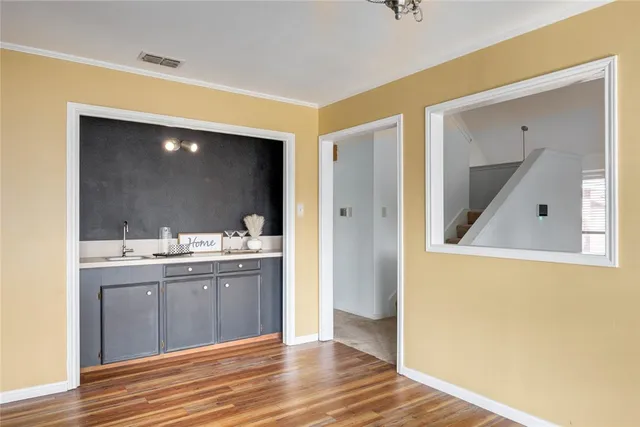 a view of a bathroom from a hallway