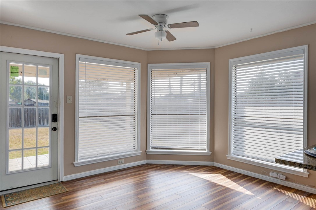 4737 Spring Fork Drive Corpus Christi, TX 78413 - Photo 13 of 37 a view of a livingroom with a window and wooden floor