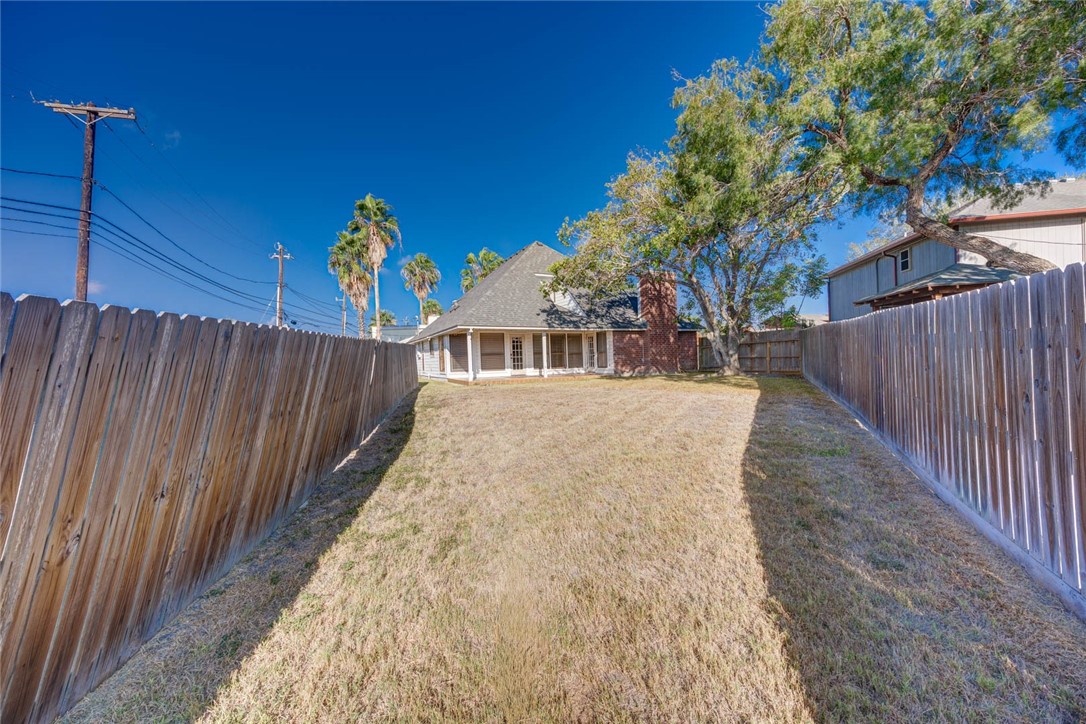 4737 Spring Fork Drive Corpus Christi, TX 78413 - Photo 33 of 37 a view of a house with a wooden fence