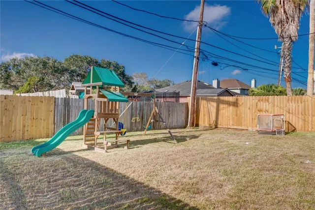 a view of a park with a slide