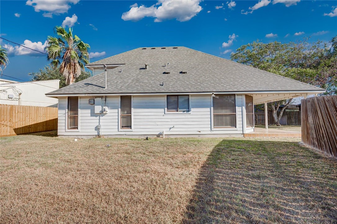 4737 Spring Fork Drive Corpus Christi, TX 78413 - Photo 37 of 37 a front view of a house with a garden