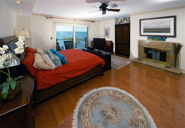 11 Bradlee Road Marblehead, MA 01945 - Photo 11 of 19 a bedroom with a bed and a flat screen tv