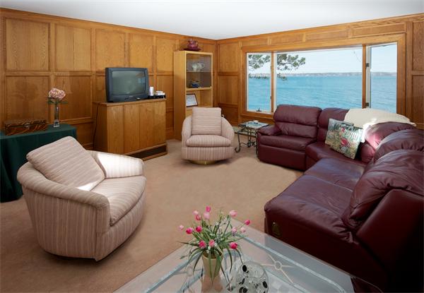 11 Bradlee Road Marblehead, MA 01945 - Photo 13 of 19 a living room with furniture and a flat screen tv