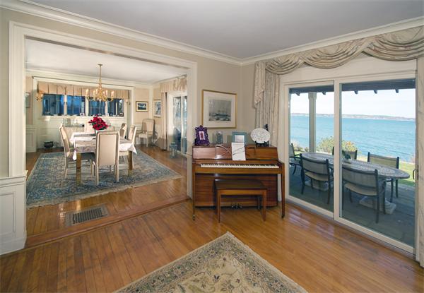 11 Bradlee Road Marblehead, MA 01945 - Photo 6 of 19 a dining room with wooden floor and large windows