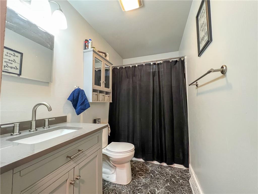 178 Hoon Road Butler, PA 16001 - Photo 14 of 26 a bathroom with a sink toilet and shower