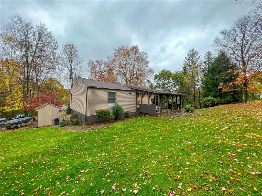 178 Hoon Road Butler, PA 16001 - Photo 21 of 26 a front view of house with yard and trees in the background