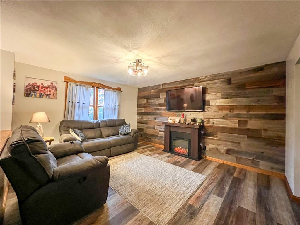 178 Hoon Road Butler, PA 16001 - Photo 3 of 26 a living room with furniture and a fireplace