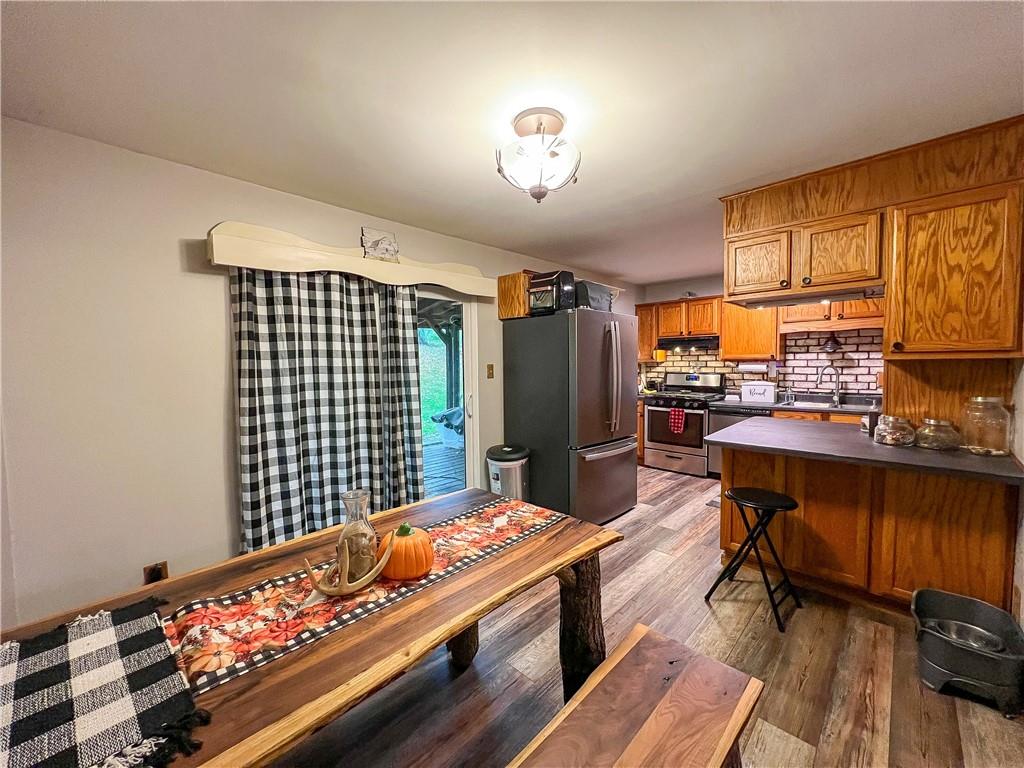 178 Hoon Road Butler, PA 16001 - Photo 6 of 26 a kitchen with a stove and a refrigerator