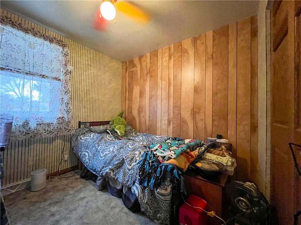 178 Hoon Road Butler, PA 16001 - Photo 10 of 26 a bed sitting in a bedroom next to a window