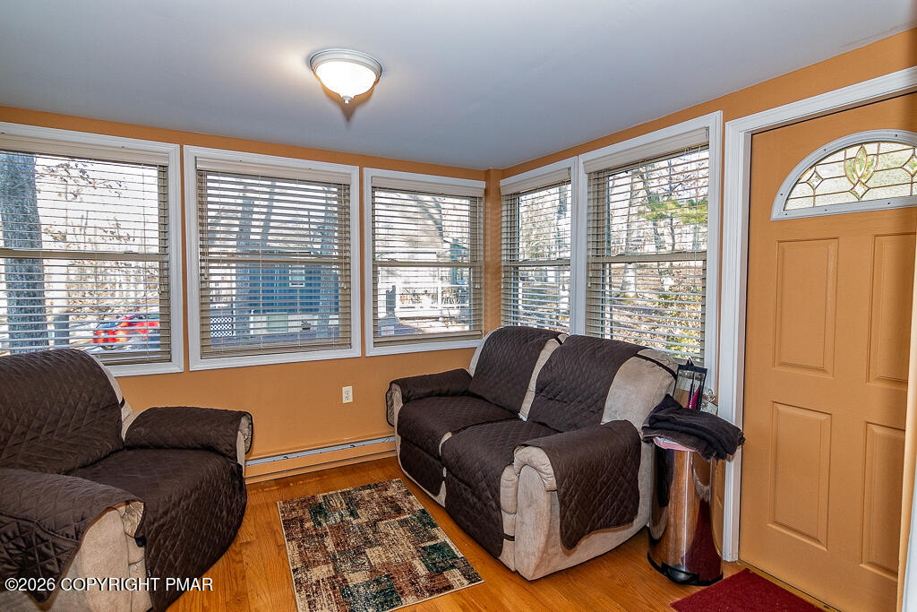122 Dover Drive Bushkill, PA 18324 - Photo 17 of 45 a living room with furniture and a window