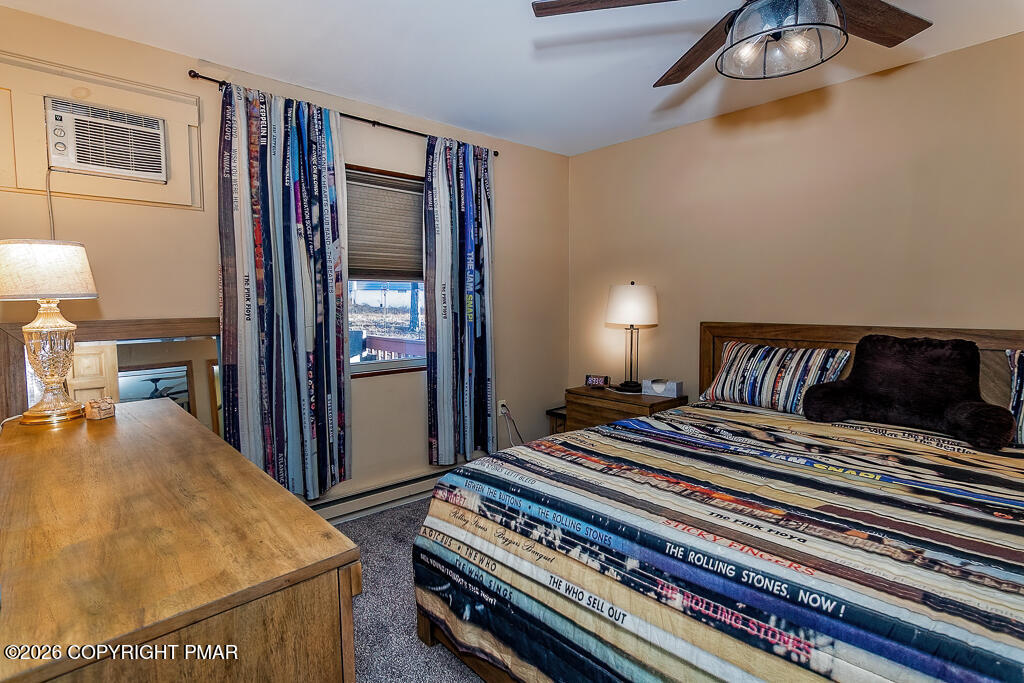 122 Dover Drive Bushkill, PA 18324 - Photo 20 of 45 a view of a bedroom with furniture and window