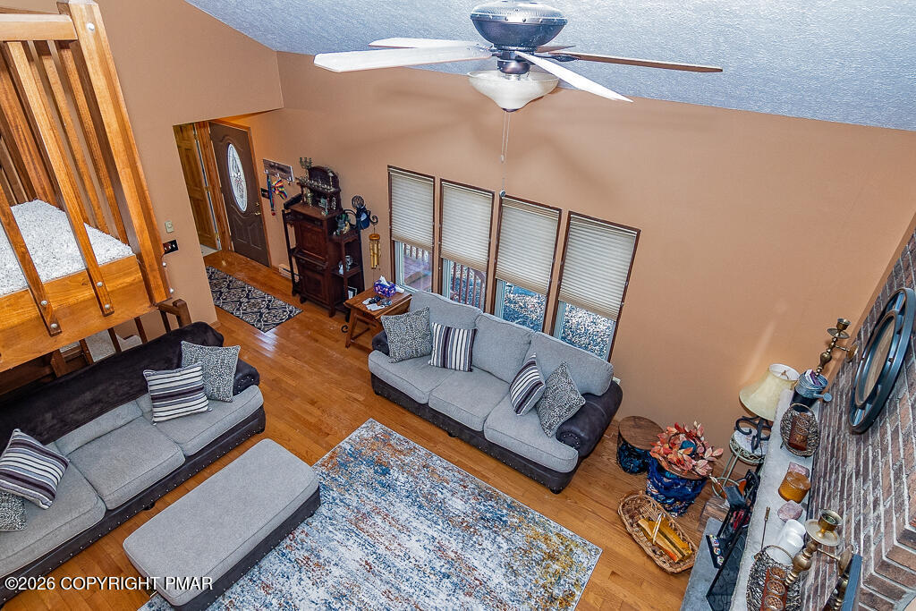 122 Dover Drive Bushkill, PA 18324 - Photo 28 of 45 a living room with furniture and a flat screen tv