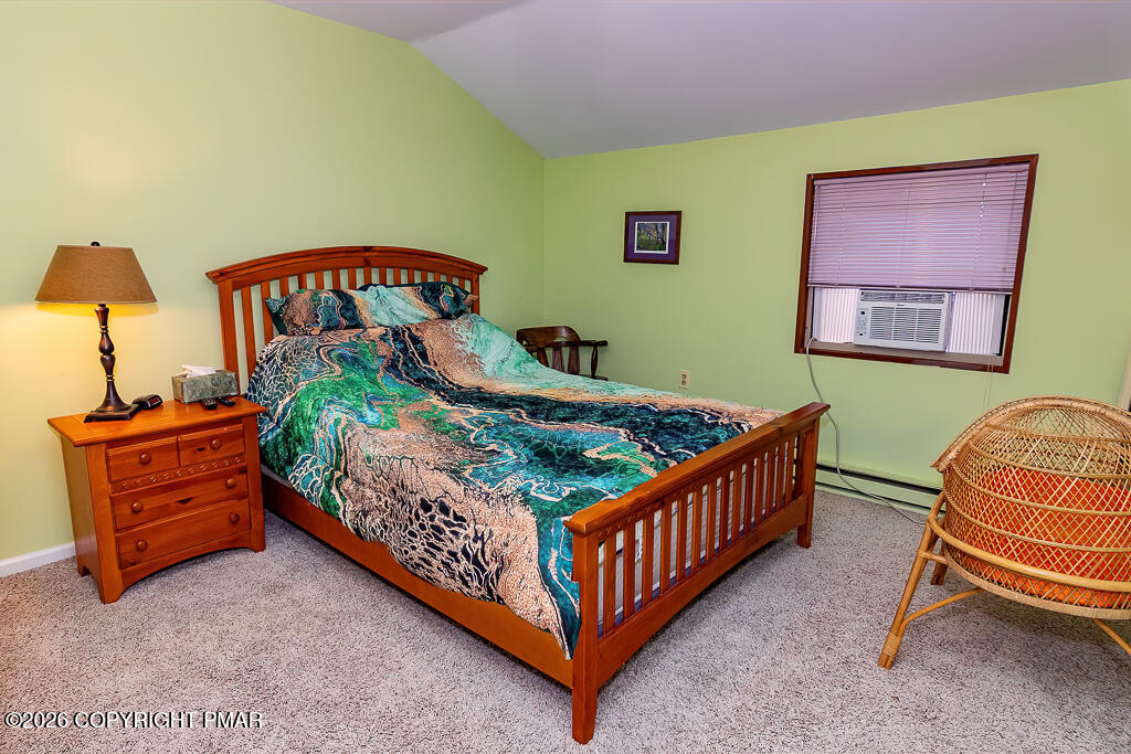 122 Dover Drive Bushkill, PA 18324 - Photo 38 of 45 a bedroom with a bed and a dresser