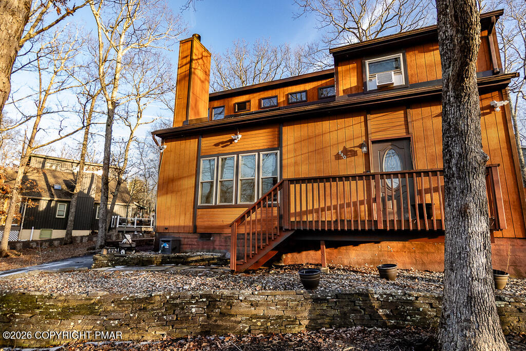 122 Dover Drive Bushkill, PA 18324 - Photo 4 of 45 front view of a house with a street