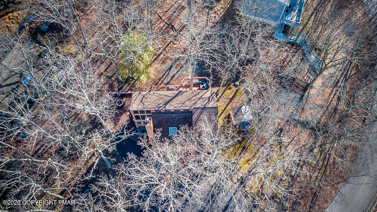 122 Dover Drive Bushkill, PA 18324 - Photo 45 of 45 a house is sitting in middle of forest