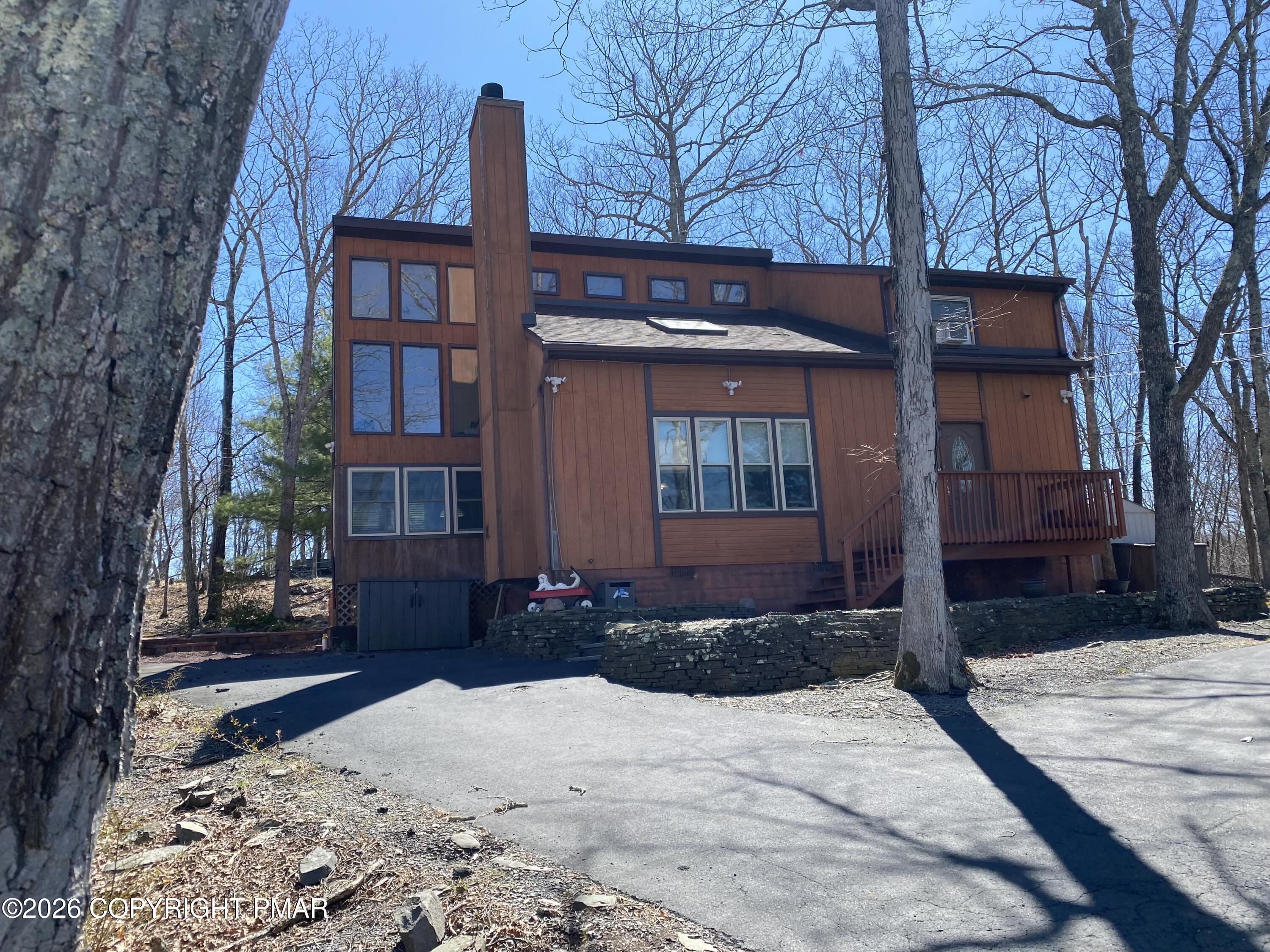 122 Dover Drive Bushkill, PA 18324 - Photo 49 of 49 a front view of a house with a yard