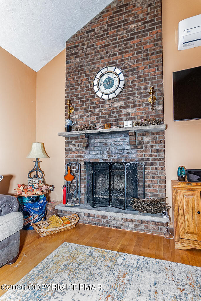 122 Dover Drive Bushkill, PA 18324 - Photo 10 of 45 a view of a livingroom with fireplace and tv