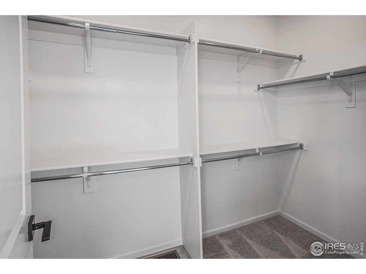 6071 Red Barn Road Timnath, CO 80547 - Photo 28 of 40 MASTER BEDROOM WALK IN CLOSET