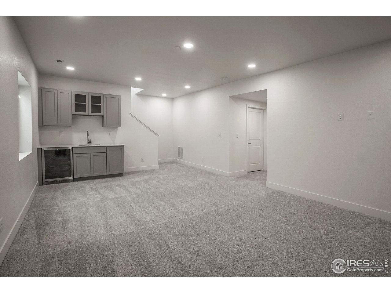 6071 Red Barn Road Timnath, CO 80547 - Photo 31 of 40 FINISHED BASEMENT REC ROOM