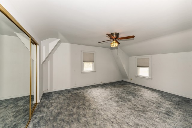 333 South Wolf Road Des Plaines, IL 60016 - Photo 15 of 25 a view of room with window and ceiling fan