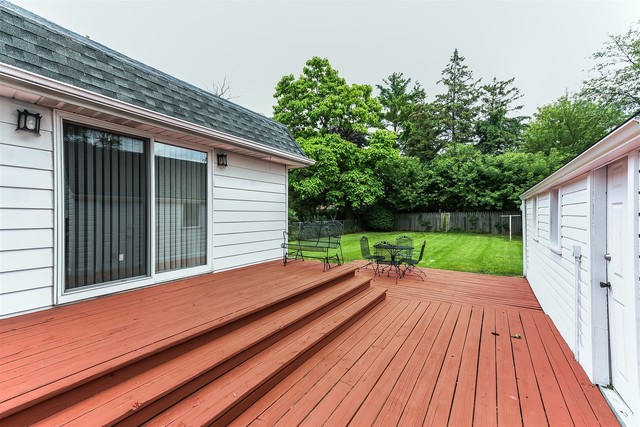333 South Wolf Road Des Plaines, IL 60016 - Photo 23 of 25 a view of backyard with wooden floor and fence