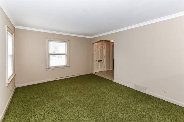 333 South Wolf Road Des Plaines, IL 60016 - Photo 4 of 25 an empty room with window