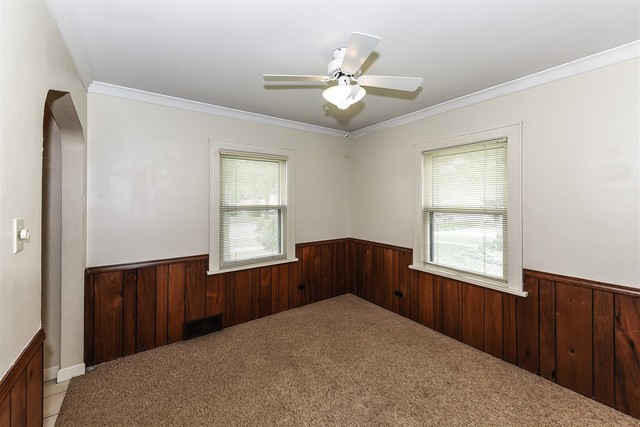333 South Wolf Road Des Plaines, IL 60016 - Photo 9 of 25 a bedroom with a bed and a window