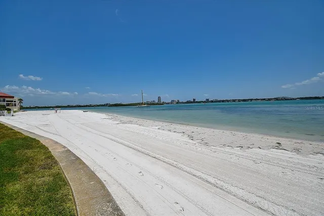 a view of swimming pool and outdoor seating