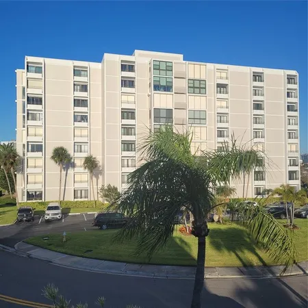 a view of backyard with trampoline