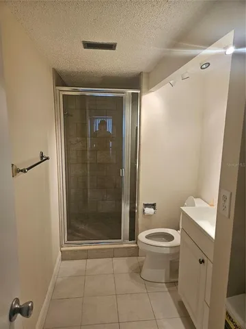 a view of a livingroom with wooden floor